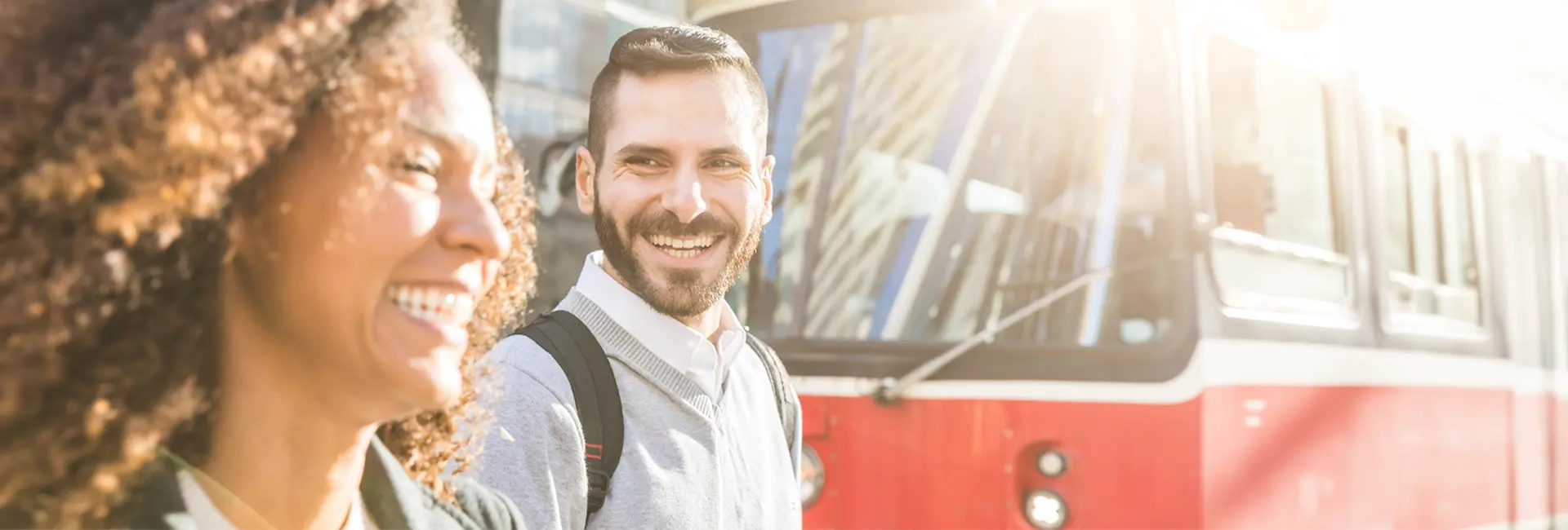 Happy residents exploring Ontario transit near Atria apartments for rent